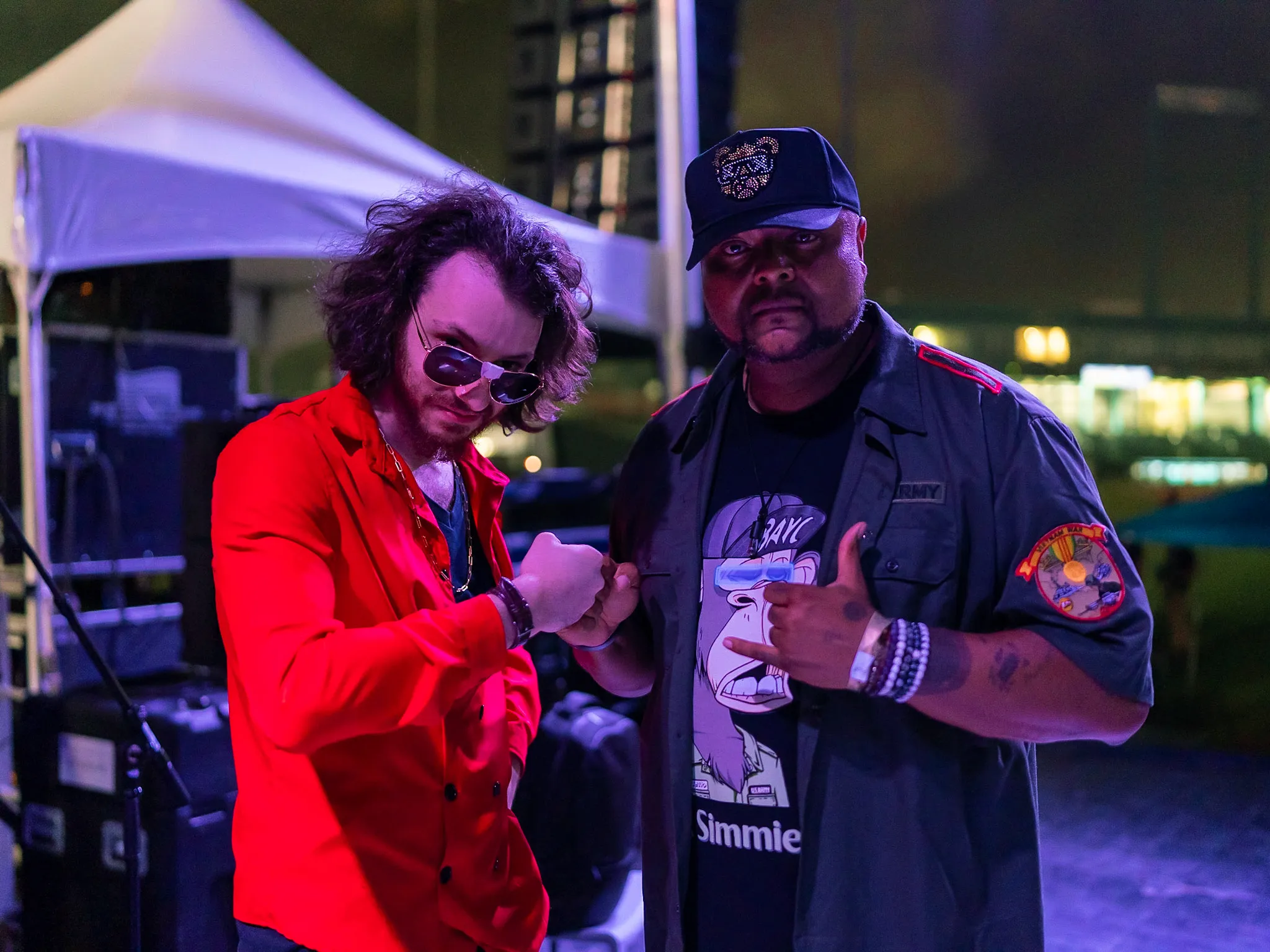 Rito bumping fists with Damon Elliott at Dogepalooza