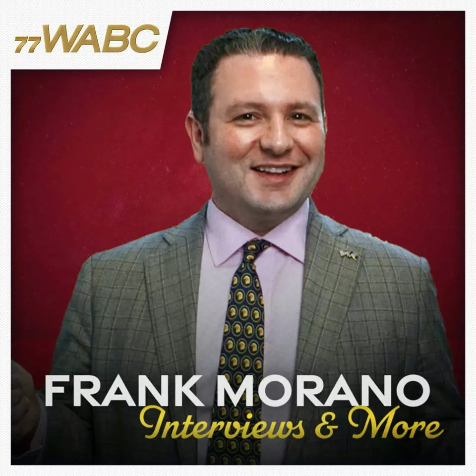 Frank Morano smiling wearing a grey suit with a caption saying "Frank Morano Interviews and More"